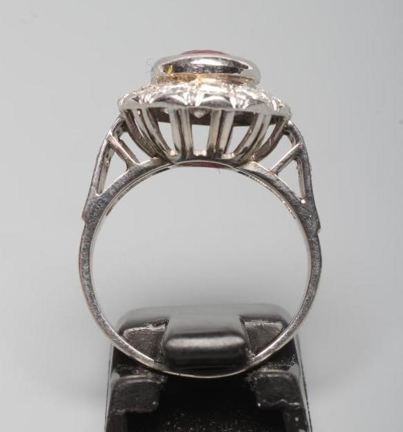A RUBY AND DIAMOND CLUSTER RING Image