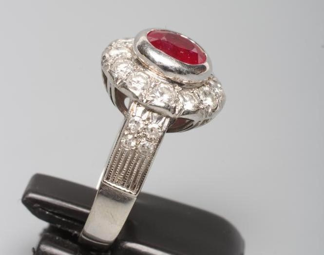 A RUBY AND DIAMOND CLUSTER RING Image