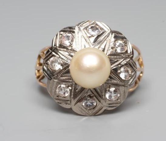 A PEARL AND DIAMOND COCKTAIL RING Image