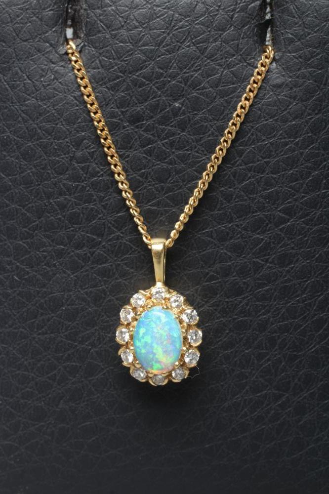 AN OPAL AND DIAMOND CLUSTER PENDANT Image