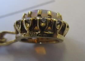 AN OPAL AND DIAMOND CLUSTER PENDANT Image