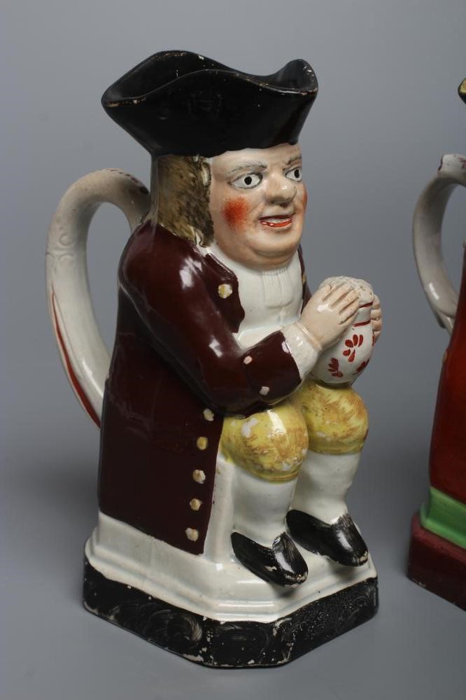 A PEARLWARE SMALL TOBY JUG Image