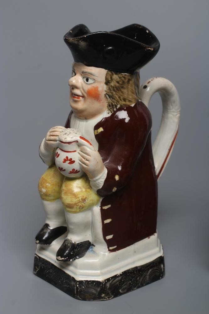 A PEARLWARE SMALL TOBY JUG Image