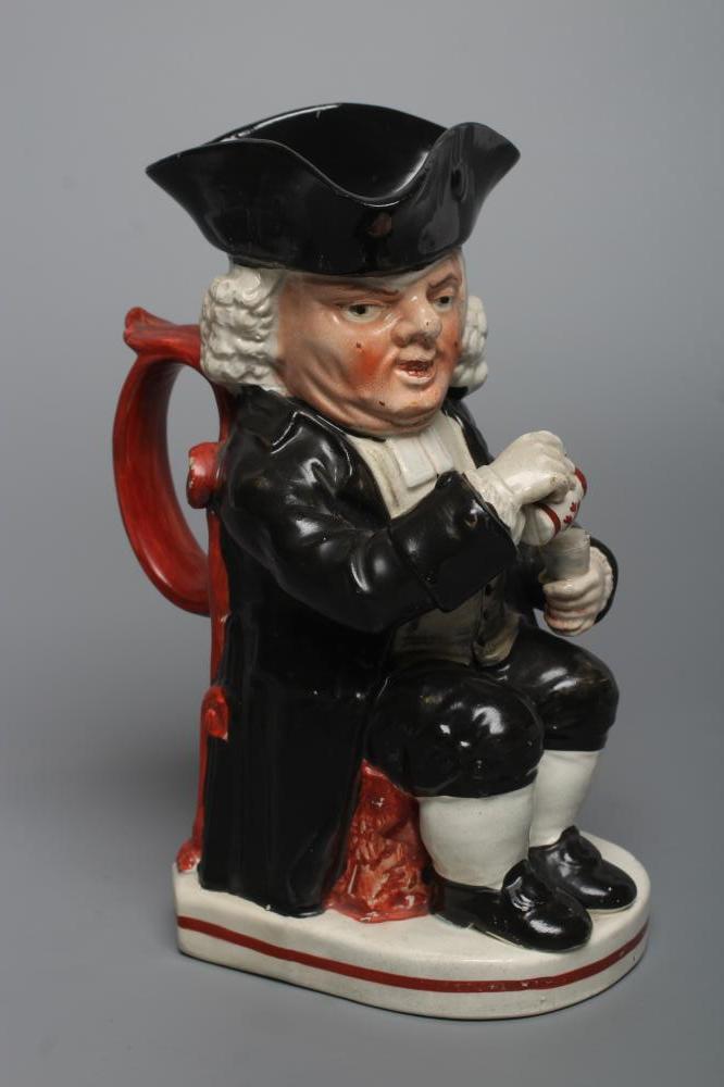 AN ENOCH WOOD TYPE EARTHENWARE DRUNKEN PARSON OR DR. JOHNSON TOBY JUG Image