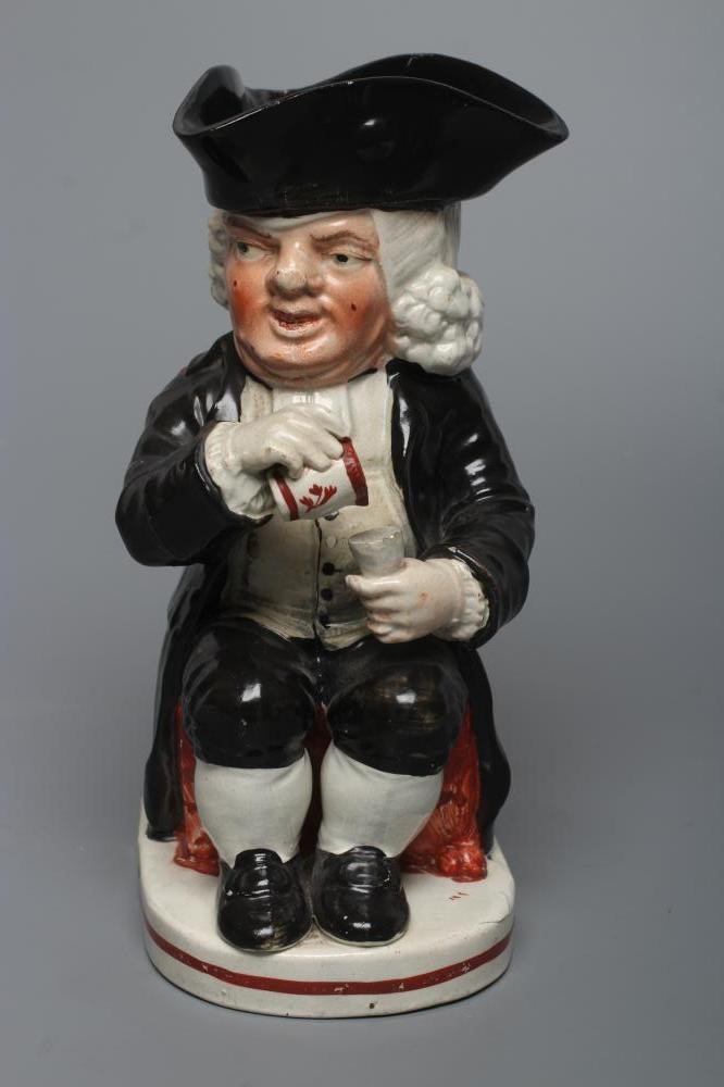 AN ENOCH WOOD TYPE EARTHENWARE DRUNKEN PARSON OR DR. JOHNSON TOBY JUG Image
