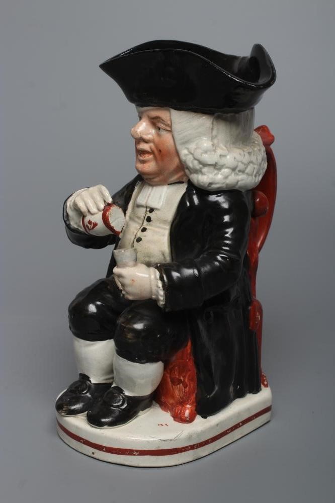 AN ENOCH WOOD TYPE EARTHENWARE DRUNKEN PARSON OR DR. JOHNSON TOBY JUG Image
