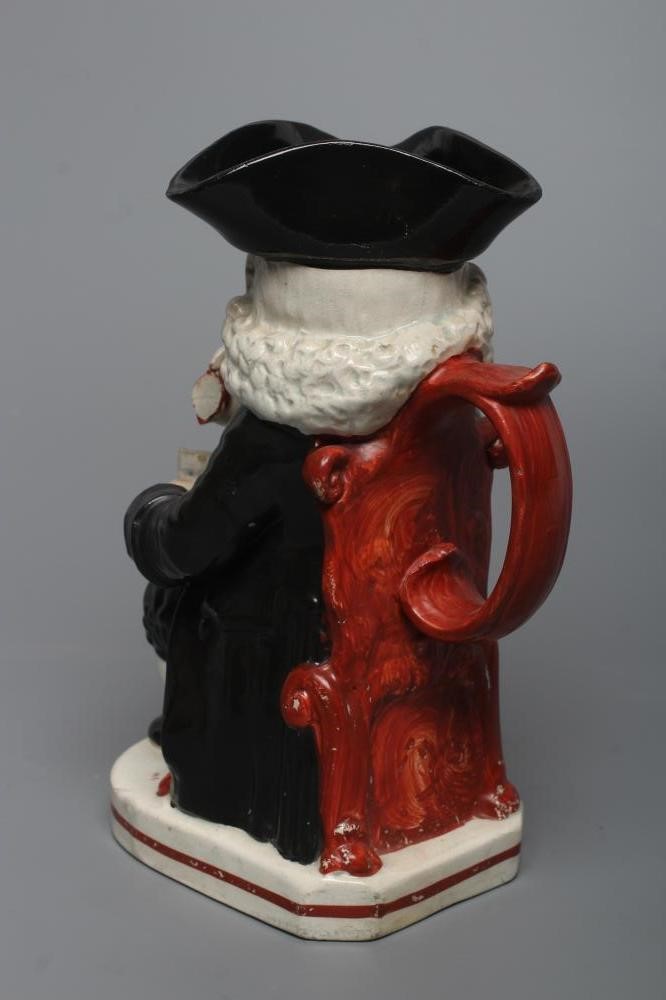 AN ENOCH WOOD TYPE EARTHENWARE DRUNKEN PARSON OR DR. JOHNSON TOBY JUG Image
