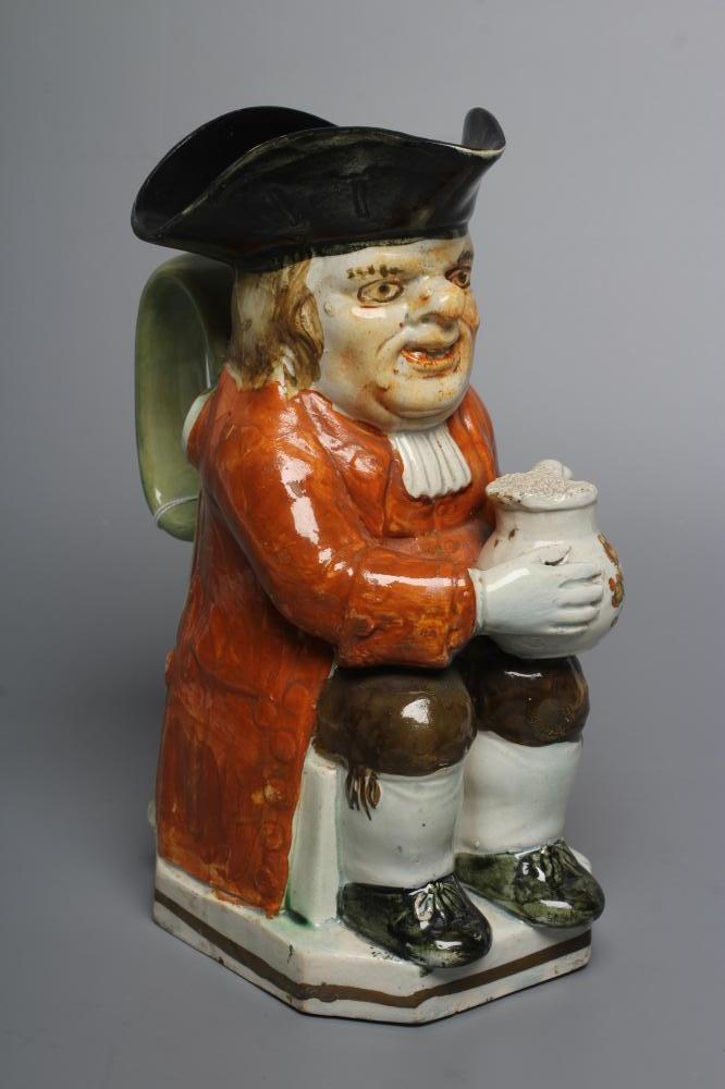 A PEARLWARE "WARTY FACE" TOBY JUG Image