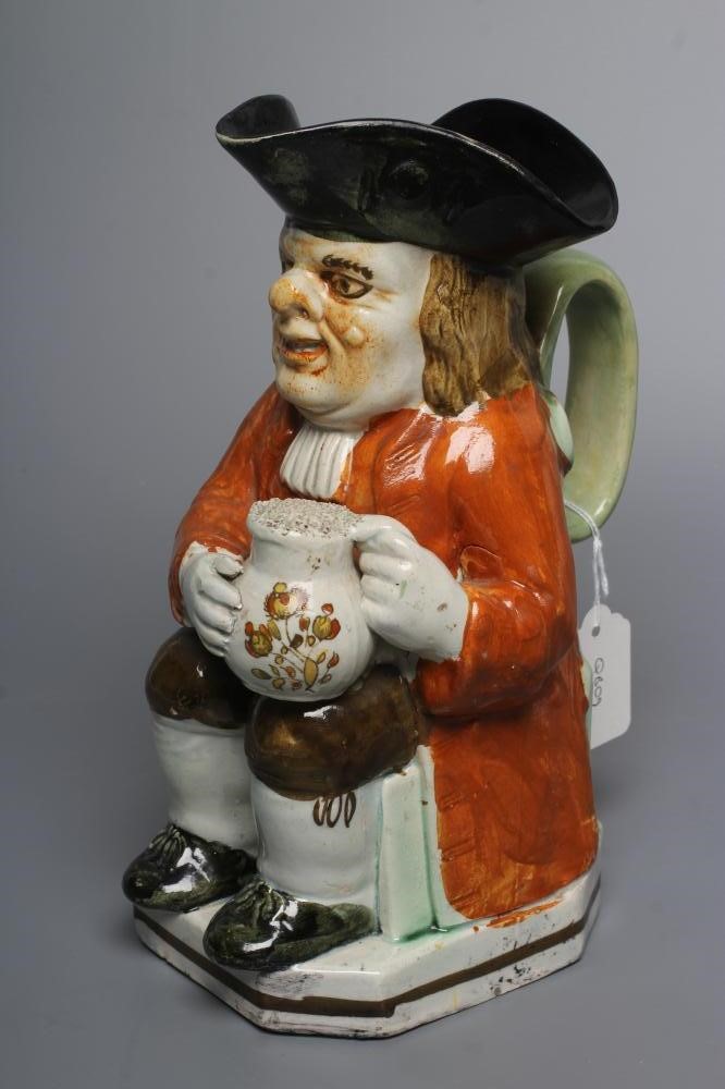 A PEARLWARE "WARTY FACE" TOBY JUG Image