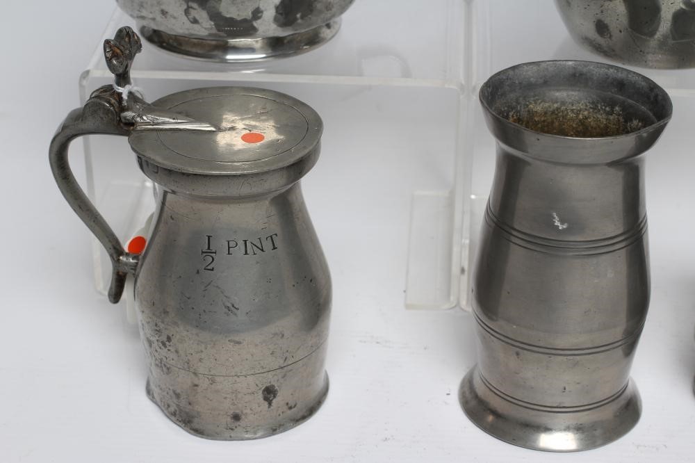 A COLLECTION OF PEWTER including a baluster half pint measure Image