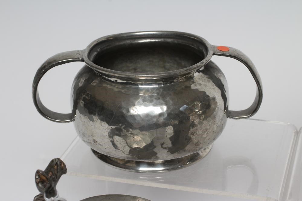 A COLLECTION OF PEWTER including a baluster half pint measure Image