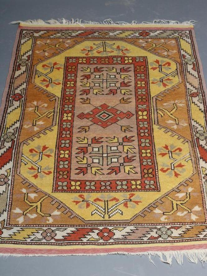 A KAZAK TYPE RUG Image