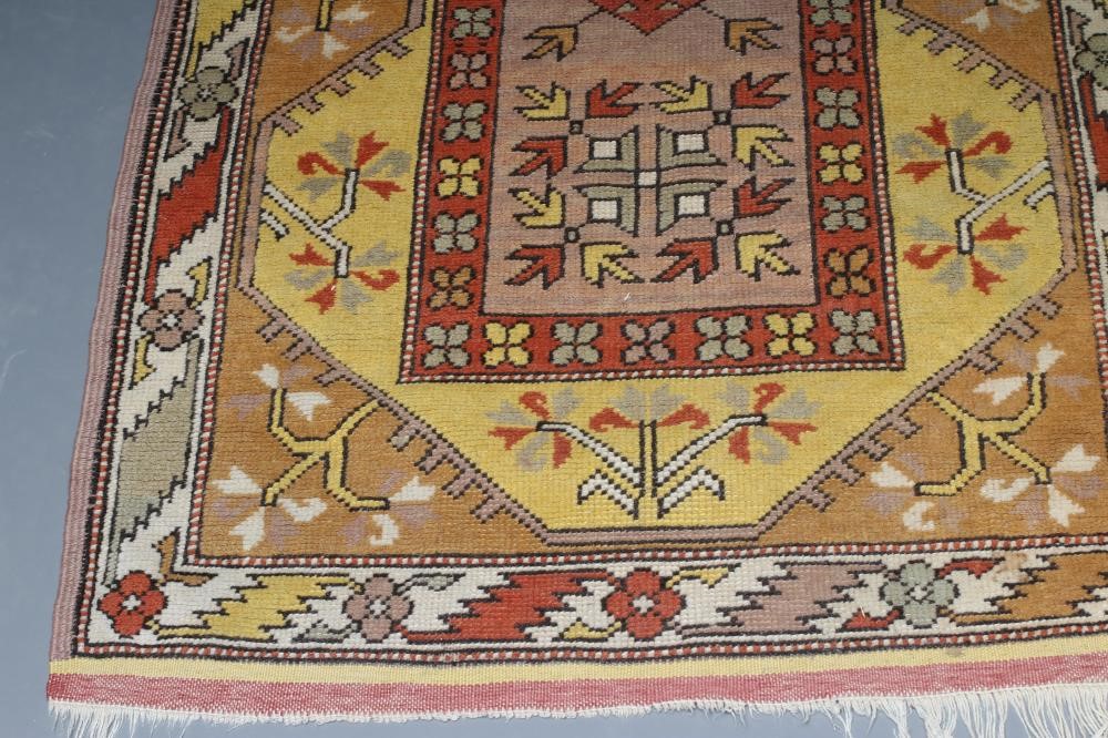A KAZAK TYPE RUG Image