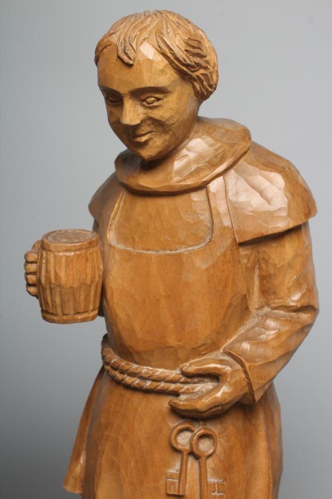 A CARVED LIMEWOOD(?) FIGURE OF A MONK Image