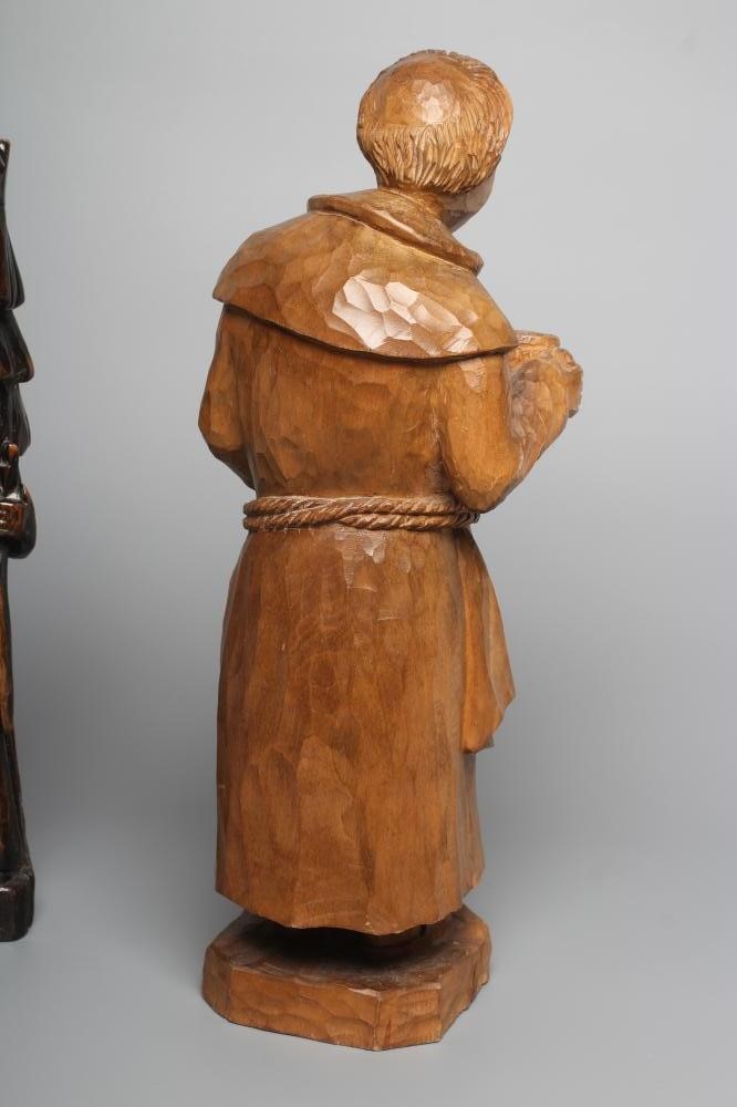 A CARVED LIMEWOOD(?) FIGURE OF A MONK Image