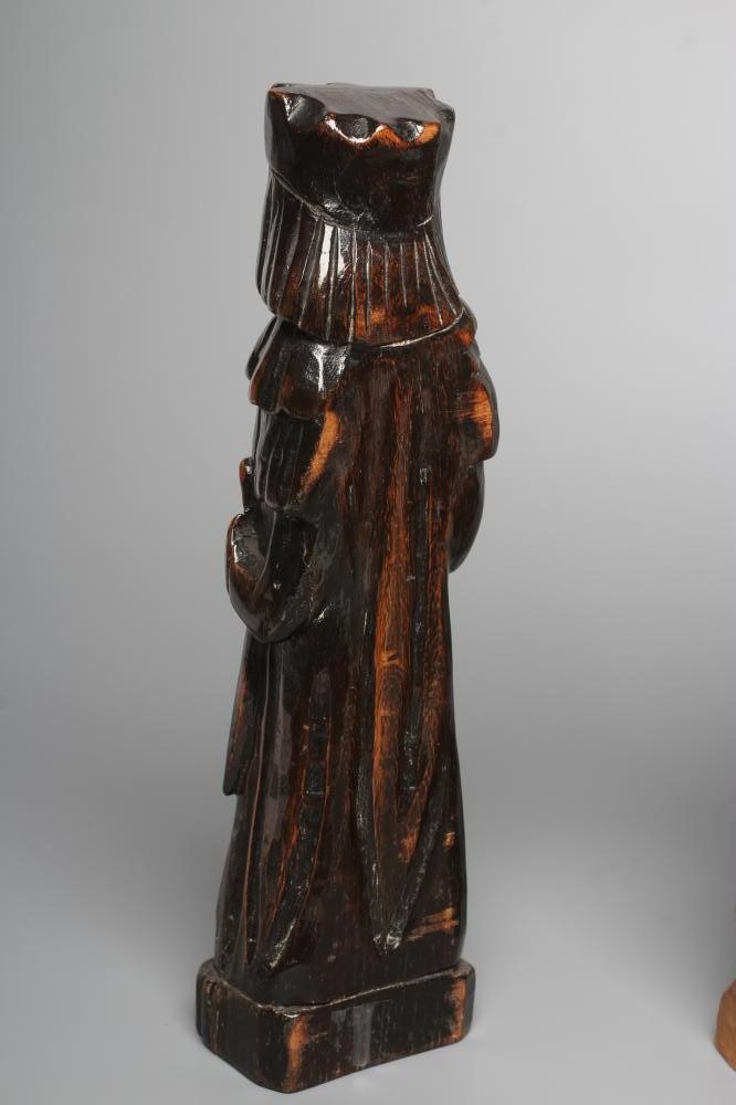 A CARVED LIMEWOOD(?) FIGURE OF A MONK Image