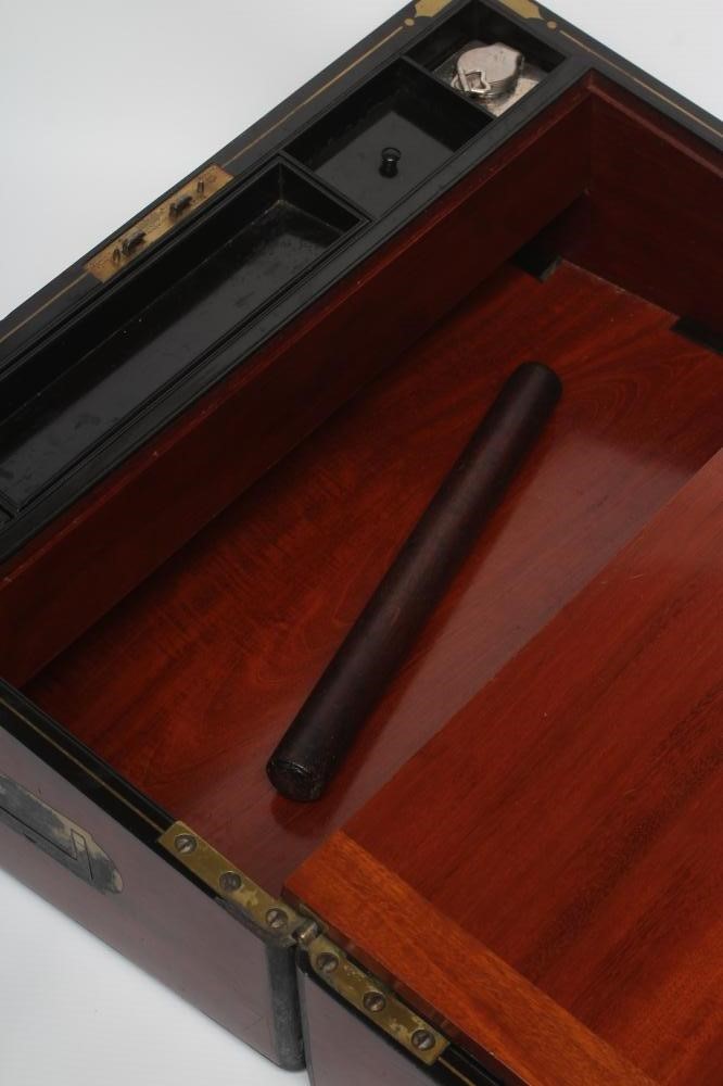 A VICTORIAN MAHOGANY AND BRASS BOUND LAP DESK Image