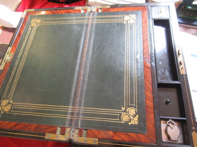 A VICTORIAN MAHOGANY AND BRASS BOUND LAP DESK Image