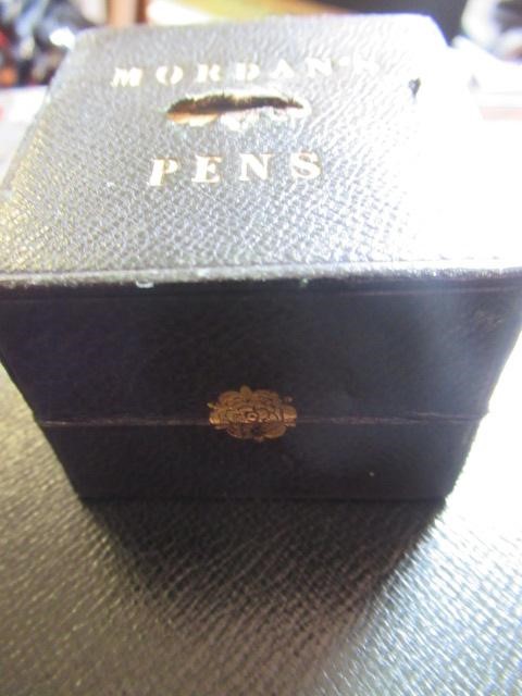 A VICTORIAN MAHOGANY AND BRASS BOUND LAP DESK Image