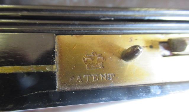 A VICTORIAN MAHOGANY AND BRASS BOUND LAP DESK Image