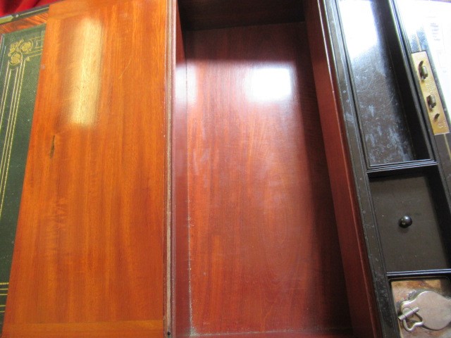 A VICTORIAN MAHOGANY AND BRASS BOUND LAP DESK Image