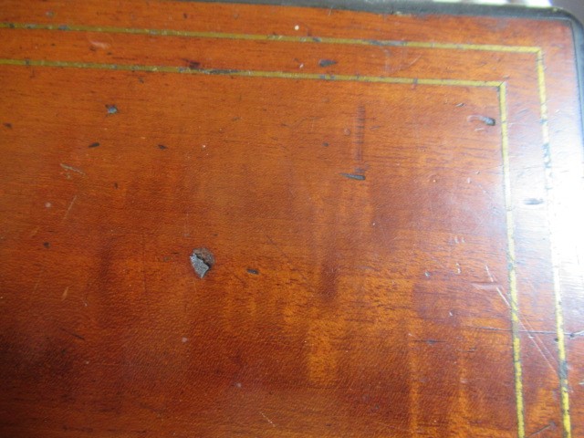 A VICTORIAN MAHOGANY AND BRASS BOUND LAP DESK Image