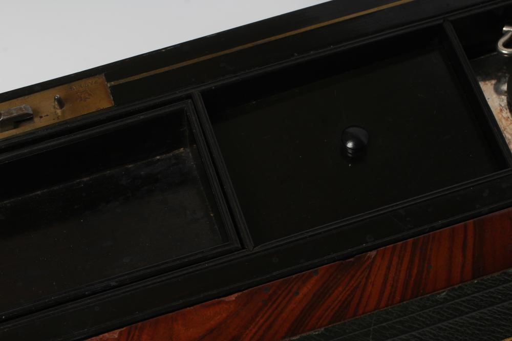 A VICTORIAN MAHOGANY AND BRASS BOUND LAP DESK Image