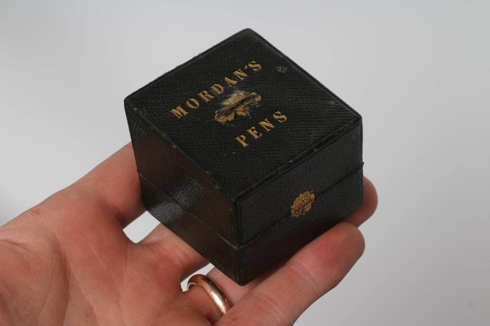 A VICTORIAN MAHOGANY AND BRASS BOUND LAP DESK Image