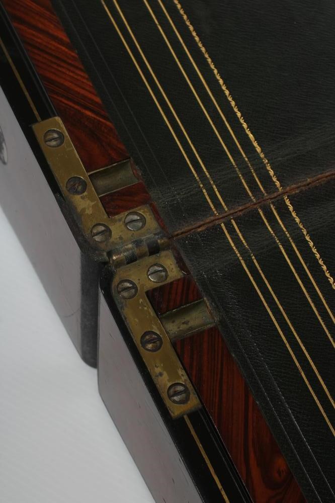 A VICTORIAN MAHOGANY AND BRASS BOUND LAP DESK Image