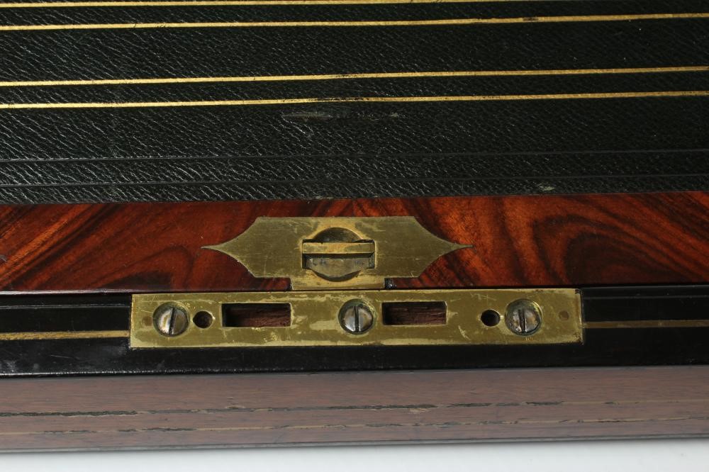 A VICTORIAN MAHOGANY AND BRASS BOUND LAP DESK Image