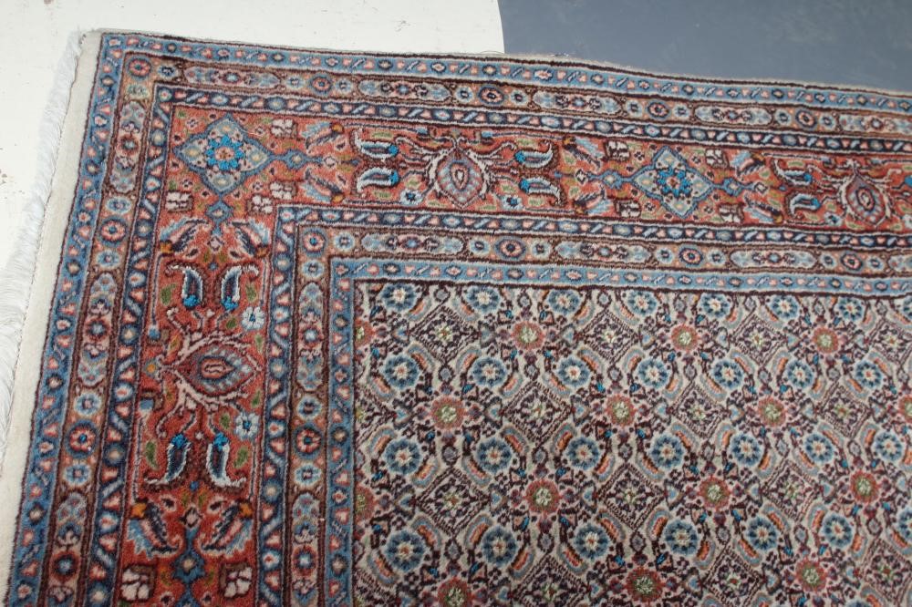 A PERSIAN RUG Image