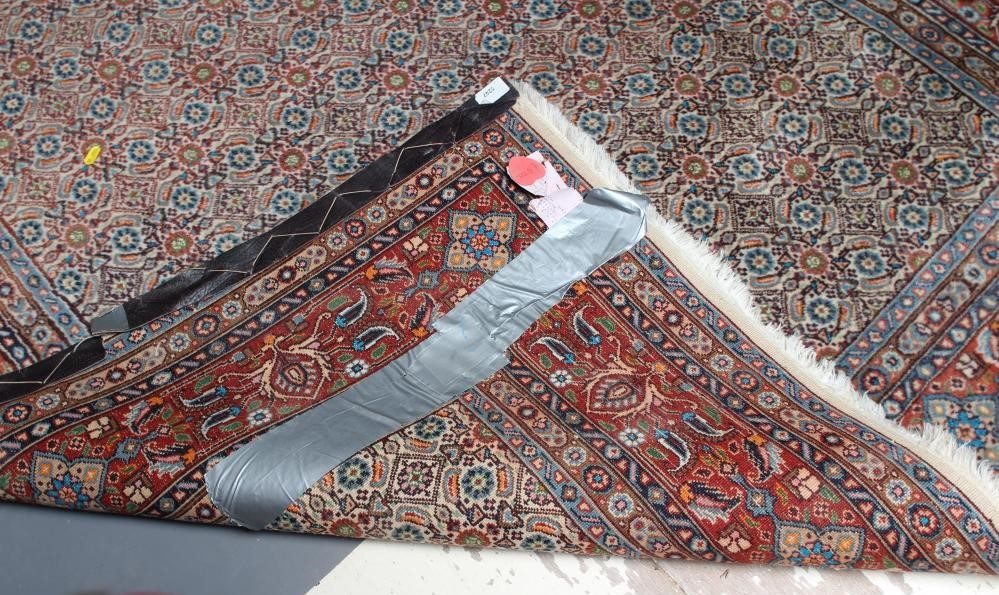 A PERSIAN RUG Image