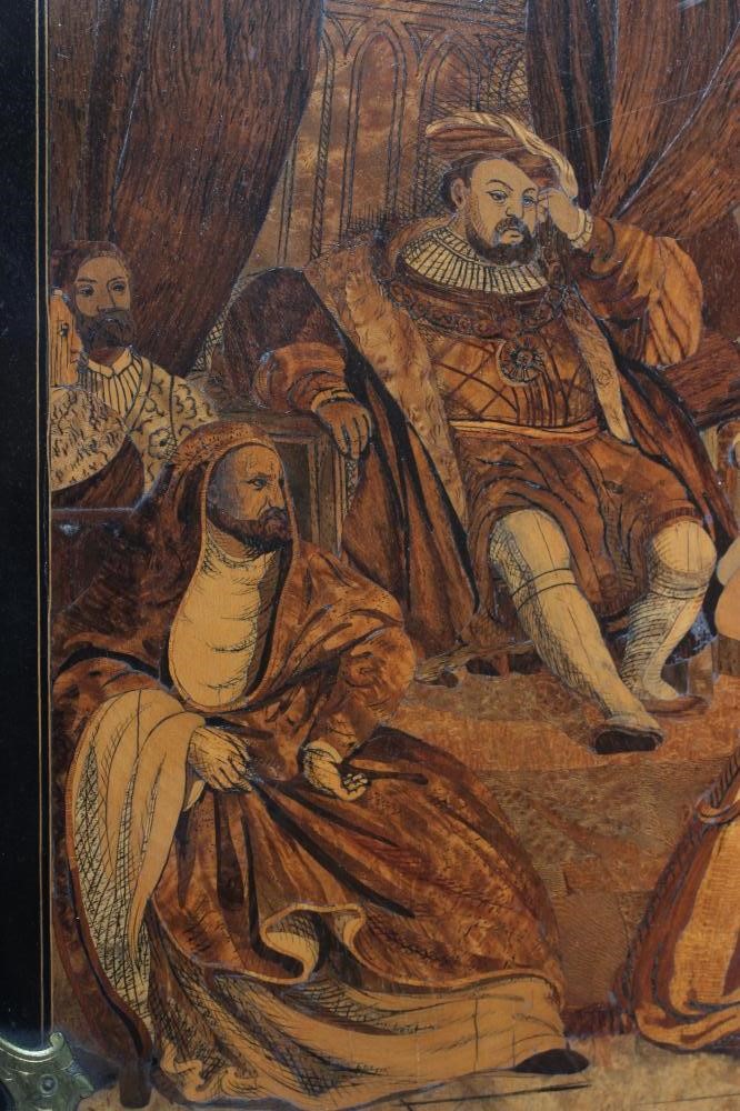 A VICTORIAN MARQUETRY PICTURE, of oblong form and depicting the court of King Henry VIII, set in a Image