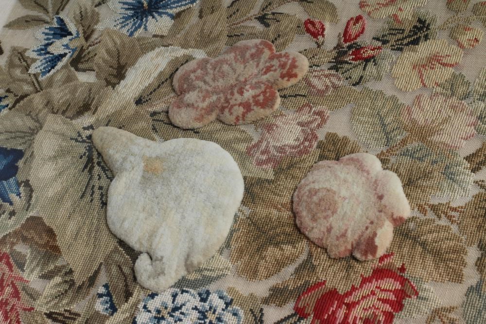 A MID VICTORIAN OVAL WOOLWORK PICTURE worked in coloured wools in full cross stitch with flowers Image