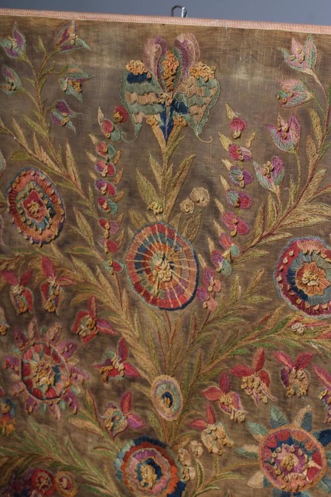 AN ART NOUVEAU STITCHED PANEL worked in coloured wools in long stitch and with knotted loops with Image