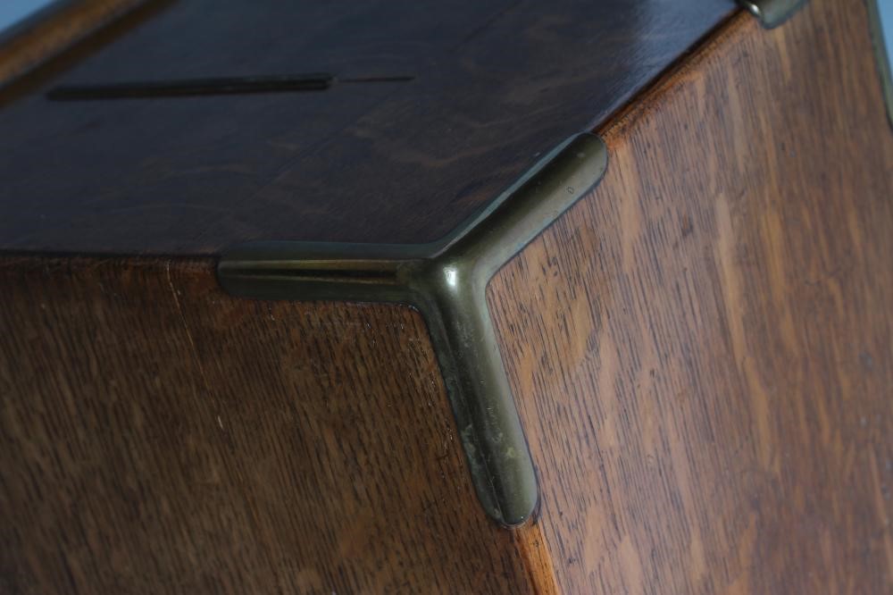 A VICTORIAN OAK AND BRASS BOUND TRAVELLING DRINKS CABINET Image