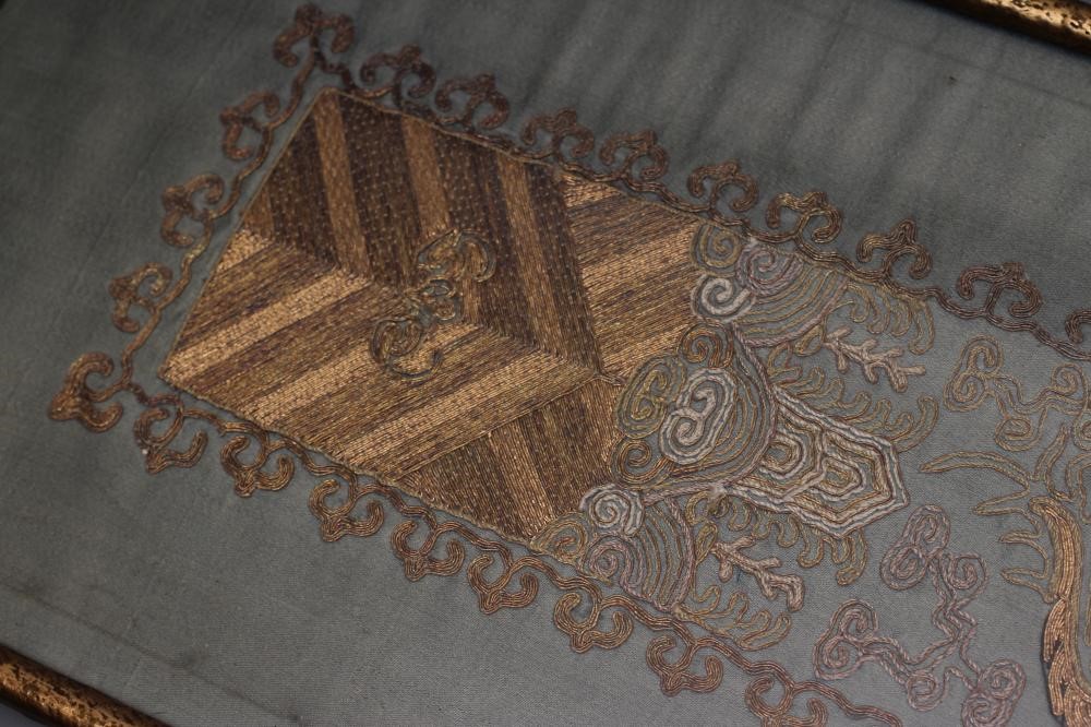 A CHINESE BLACK SILK RANK BADGE Image