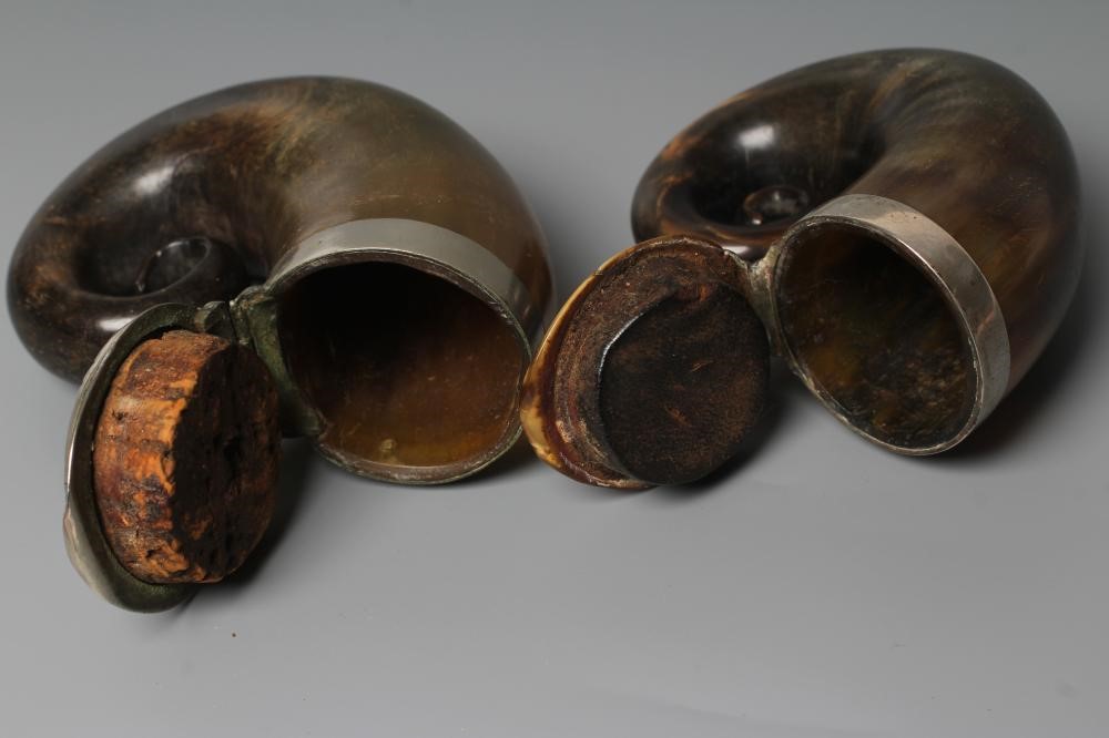 TWO VICTORIAN HORN SNUFF MULLS of typical form with plated mounts and hinged covers, 3 1/2" and 2 Image