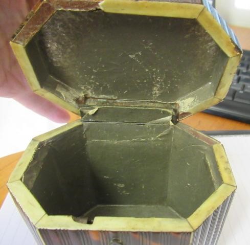 A GEORGE III SMALL TORTOISESHELL TEA CADDY Image