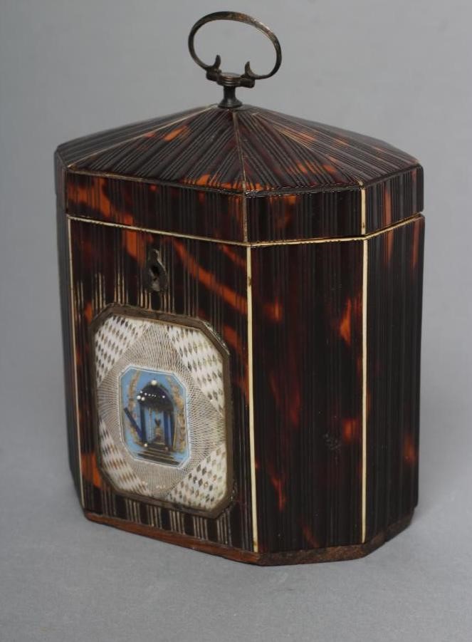 A GEORGE III SMALL TORTOISESHELL TEA CADDY Image