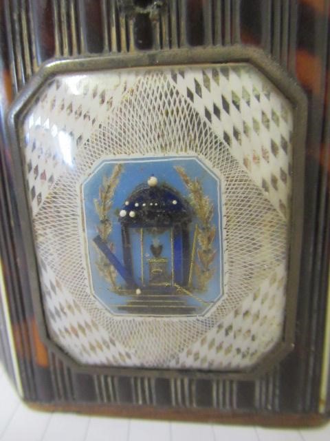 A GEORGE III SMALL TORTOISESHELL TEA CADDY Image