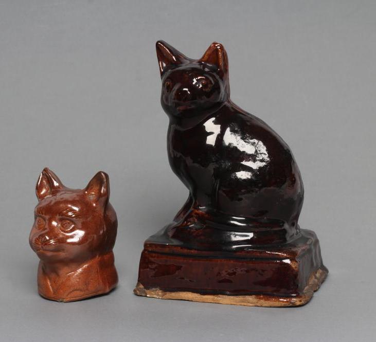 AN ENGLISH TREACLE GLAZED STONEWARE CAT Image