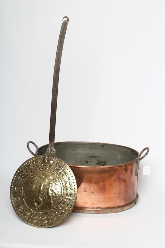 A BRASS BED WARMER Image