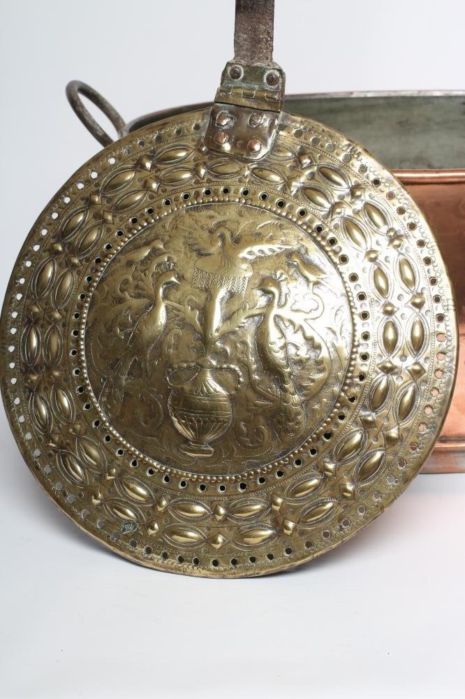 A BRASS BED WARMER Image