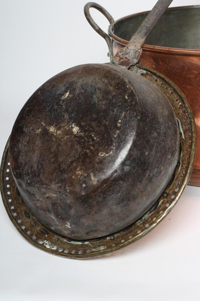 A BRASS BED WARMER Image