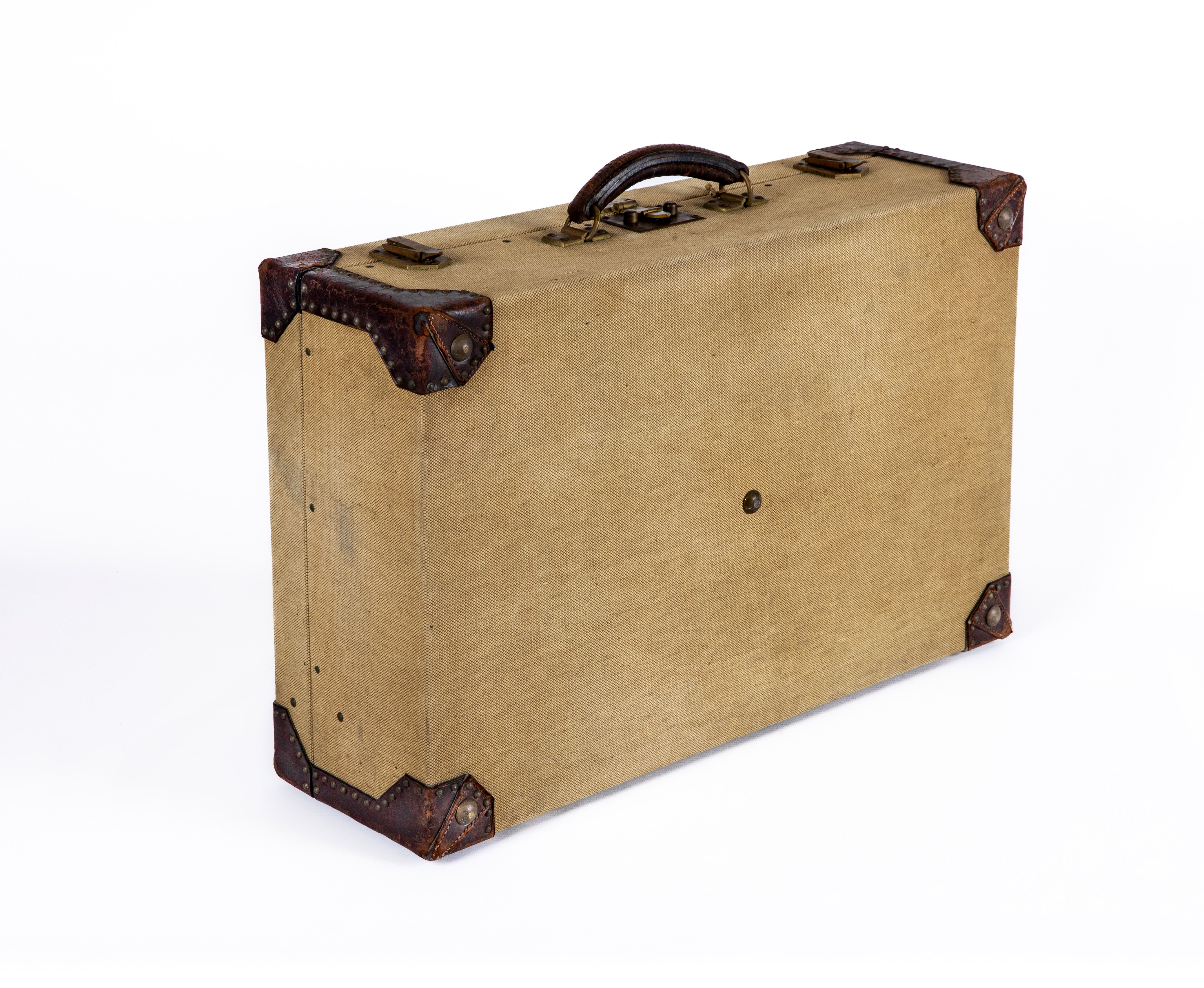 AN HERMES CANVAS AND LEATHER SUITCASE Image