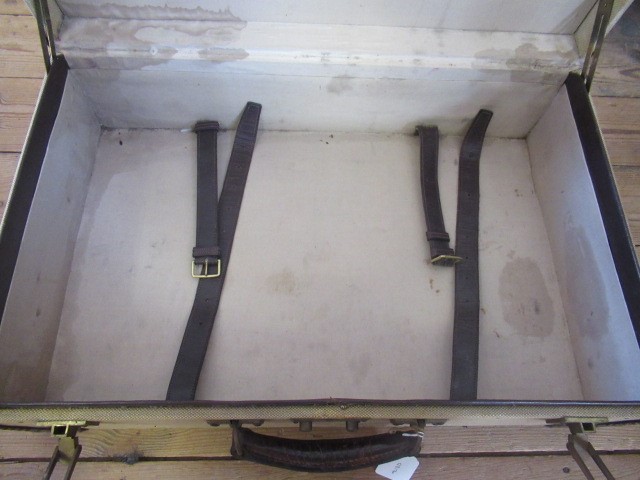 AN HERMES CANVAS AND LEATHER SUITCASE Image