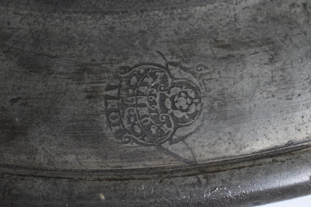 A GEORGIAN PEWTER DISH, 18th century, with single rim and ownership initials 13 1/2" wide, together Image