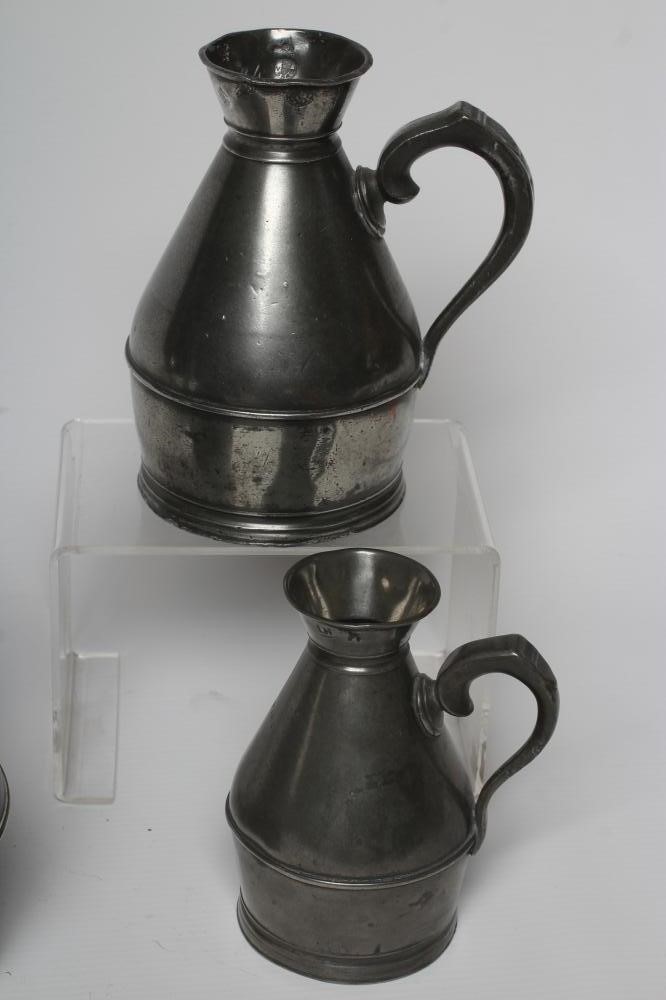 A SET OF SIX PEWTER HAYSTACK MEASURES, c.1900, stamped Austin & Son, Cork, ranging from a quart to Image