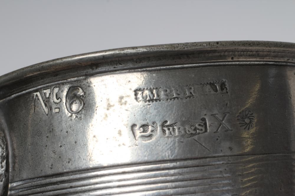 A GROUP OF FIVE PEWTER QUART REEDED MUGS, 19th century, one straight sided, the others of tulip form Image